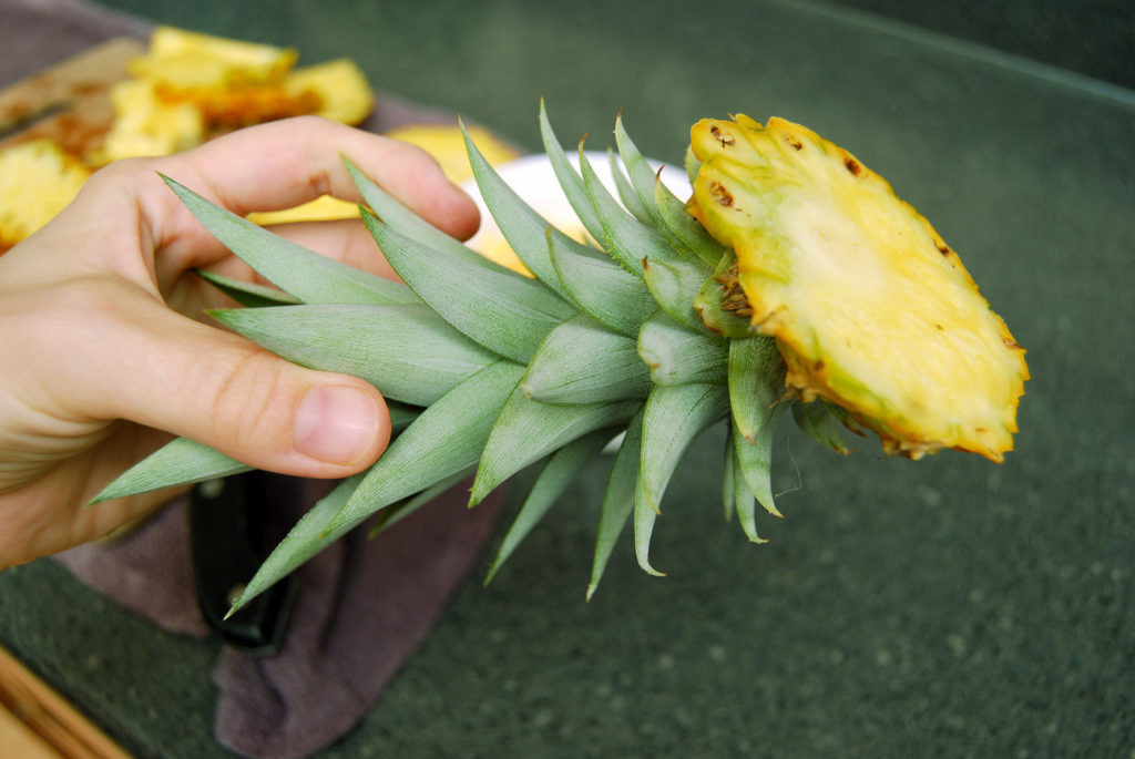 Cut the Pineapple crown from sharp knife